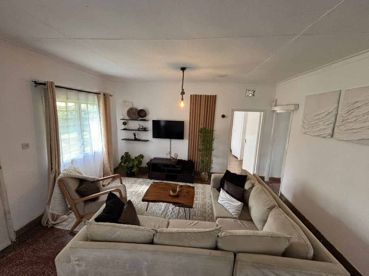 The living room · wide view — The Rustic, Eldoret