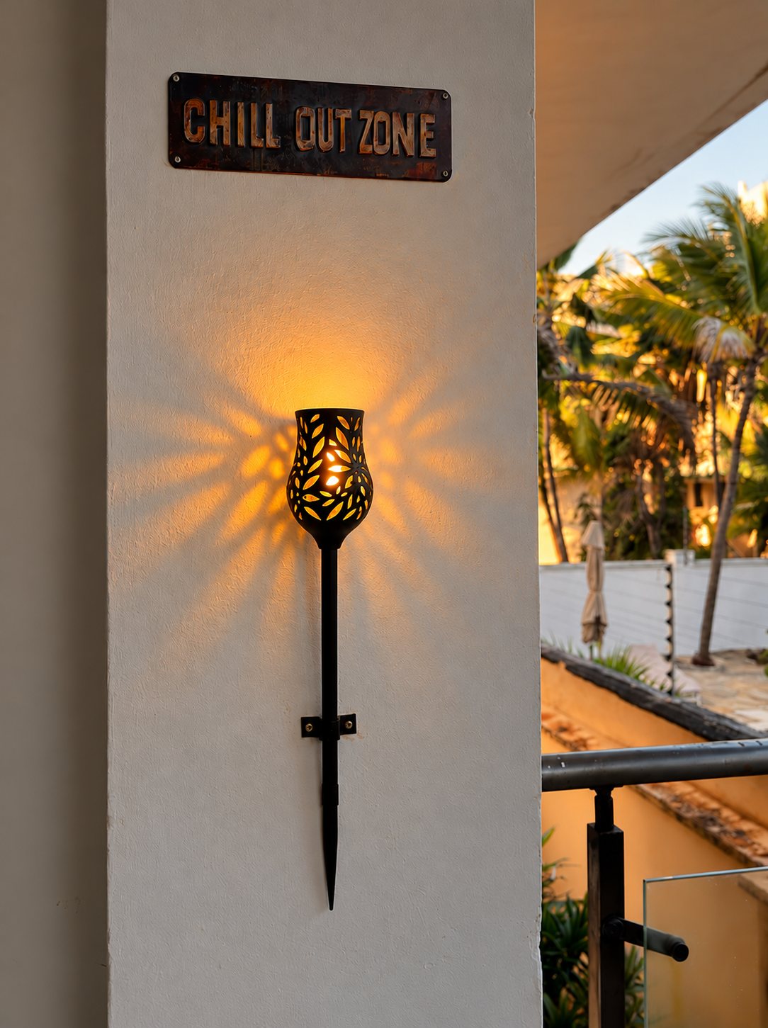 Torch wall light at dusk
