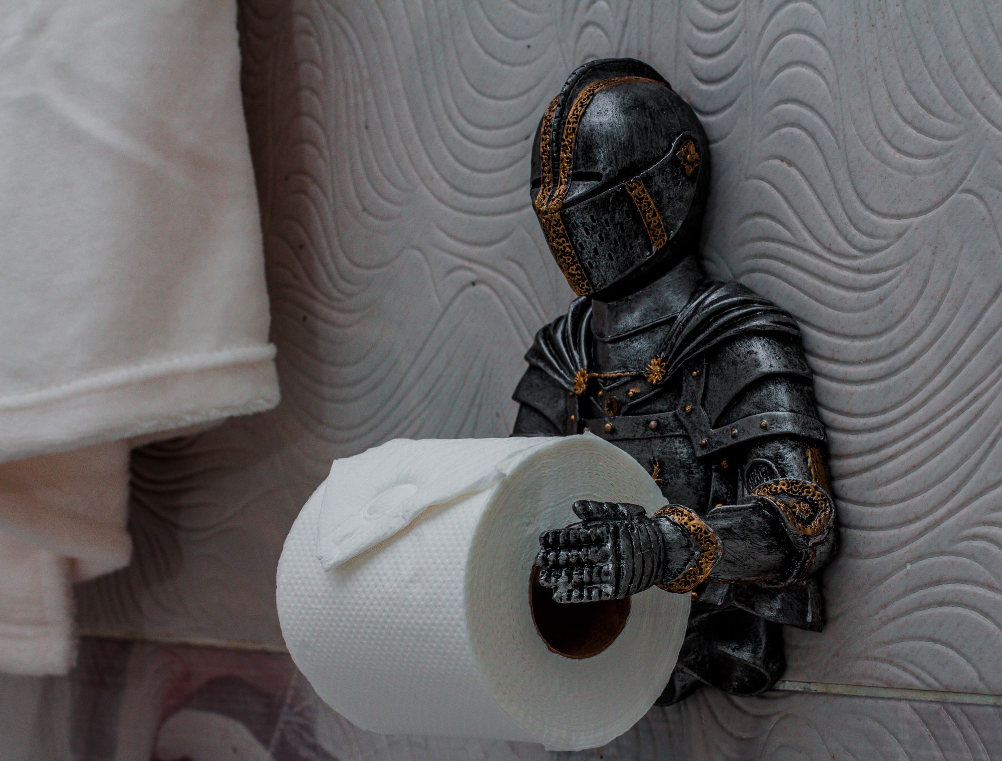 Knight toilet-roll holder